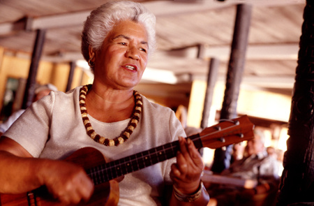 A woman strums a ukelele on Molokai, Hawaii : Travel USA : Michael Ventura Photography, Washington DC, Portraits, Stock, Caribbean, Headshots, head, shots , Photographer, Photography