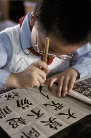 A Shanghai Chinese school boy practices his writing : Travel World : Michael Ventura Photography, Washington DC, Portraits, Stock, Caribbean, Headshots, head, shots , Photographer, Photography